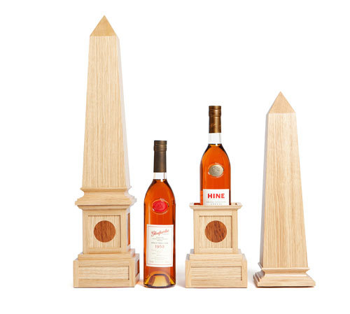 Produced in the year of the Coronation of HM Queen Elizabeth II in 1953. A pair of single vintage, single cask expressions from Hine & Glenfarclas beautifully adorned with hand-made obelisks from the Royal Warrant holding Cabinet maker Neil Stevenson.