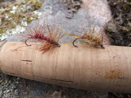 Well-chewed Claret and standard sedge – now minus their deer-hair wings thanks to the attentions of the local trout.