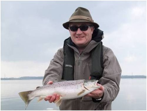 A happy Sean with a cracking over-wintered Grafham Brown Trout – taken while conditions were still calm