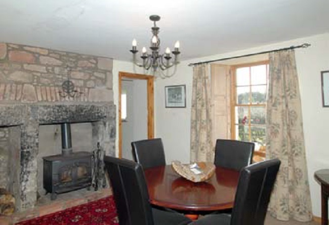 Langbank Farmhouse offers cottage charm with a wealth of original features throughout