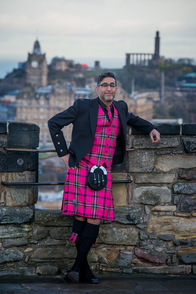 Sanjeev Kohli unveils the bold new tartan for Edinburgh's Hogmanay 
 2018 (Photo: Ian Georgeson)