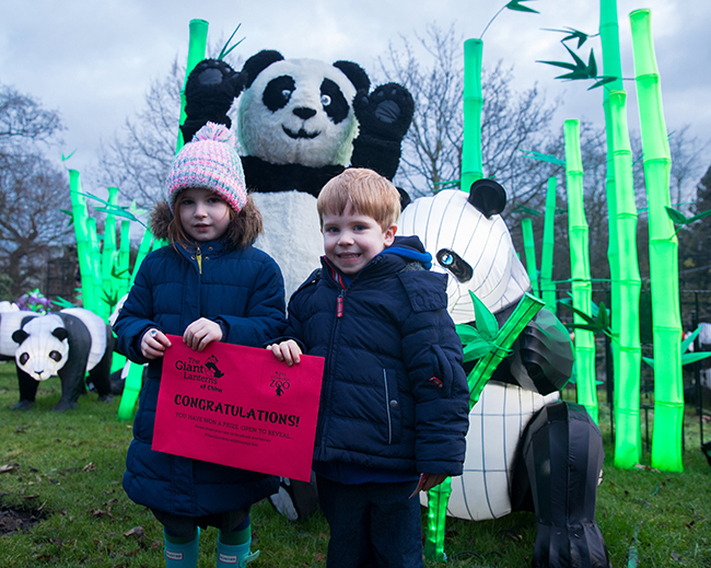 Flora and Archie Scott from Edinburgh help launch Edinburgh Zoo's city-wide treasure hunt for mysterious red envelopes

