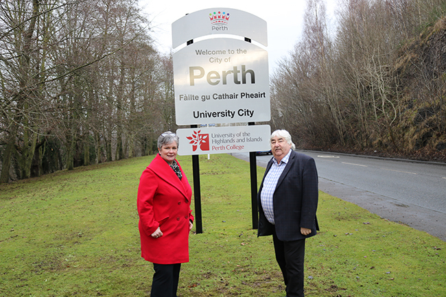 Margaret Cook of Perth College and council leader Ian Campbell, with one of the new signs