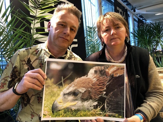 Chris Packham (left) with a picture of missing golden eagle Fred (Photo: Chris Packham/Twitter)