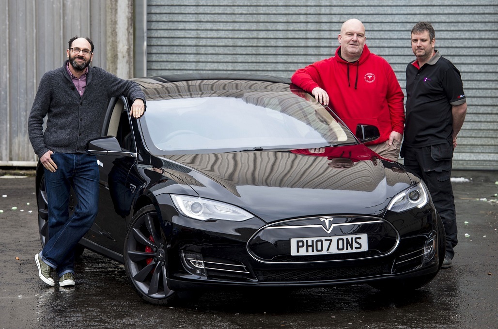 Glasgow Museums is gifted a Tesla Model S P85+, and pictured are (from left) Neil Johnson-Symington, Curator of Transport and Technology with Glasgow Museums, Chris Clarkson, who gifted Glasgow Museums the car, and Andy Howe, Conservator of transport and technology at Glasgow Life.