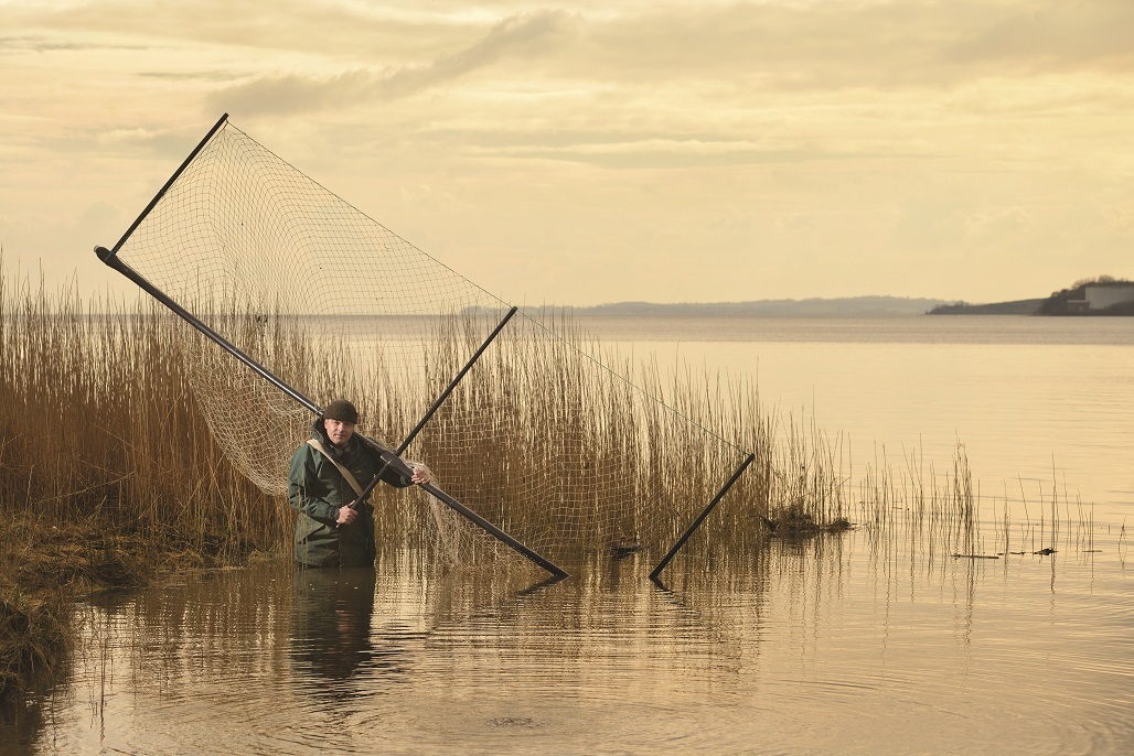 Robbie Cowan
with a haaf net, used in an
ancient form of fishing that dates back to the Vikings