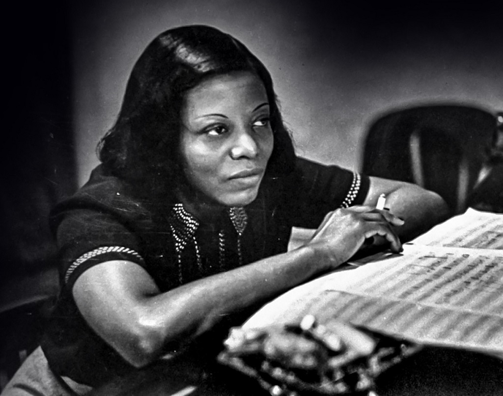 Jazz musician Mary Lou Williams, music in front of her, listening to playback of recording she has just made.  (Photo by W. Eugene Smith/The LIFE Picture Collection/Getty Images)