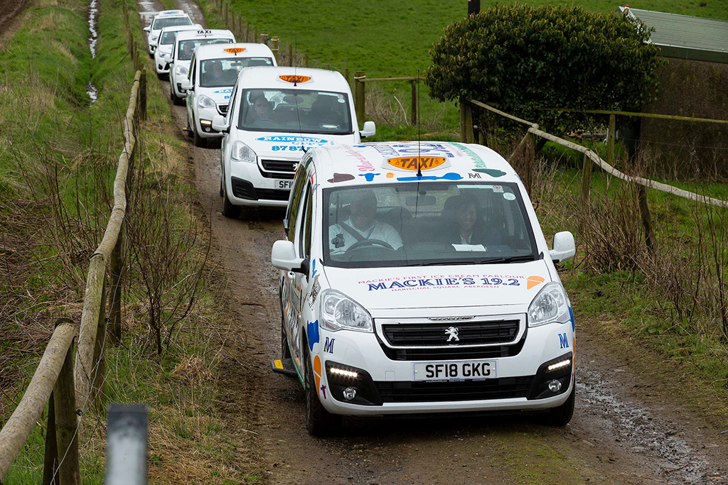 The Rainbow Taxis cabbies make their way to the Mackies' farm