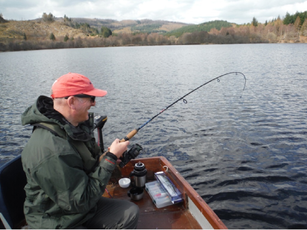 A nice pike putting a good bend in a light rod