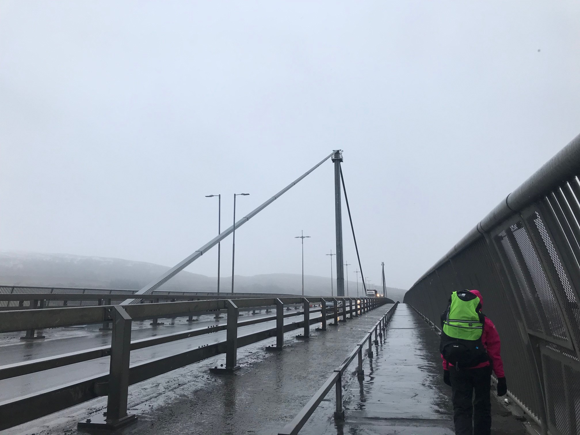 Lorna leads the way onto the Erskine Bridge on a rainy day one.