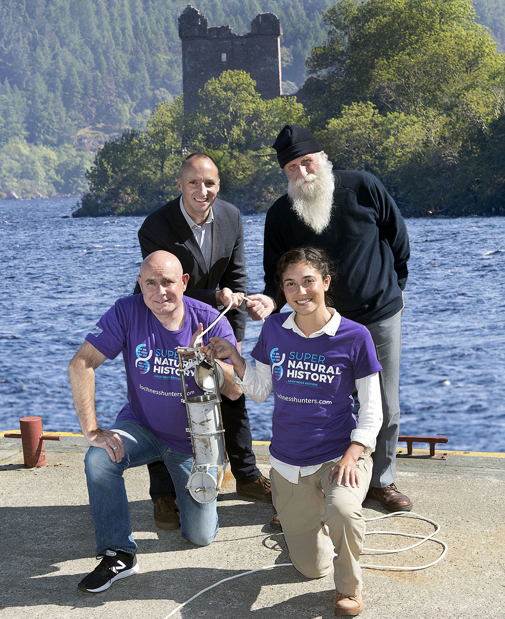 A new investigation to uncover anything unusual lurking in Loch Ness has begun. Pictured are (L-R back) – Chris Taylor, VisitScotland Regional Leadership Director, Adrian Shine, Leader of the Loch Ness Project, (front) Professor Neil Gemmell, leader of the Super Natural History Team, and Christina Lynggaard, member of the Super  Natural        History Team (Photo: Trevor Martin)