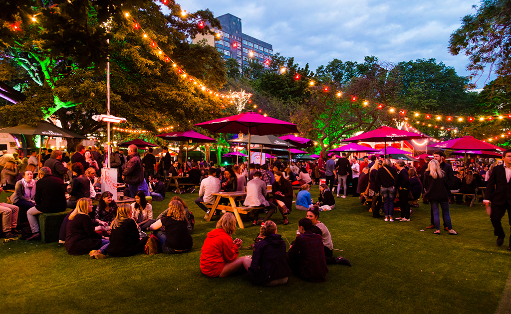 Visitors enjoying the Edinburgh Food Festival on a pleasant summer evening