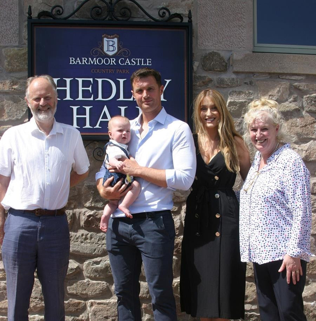 Lord Joicey of Ford &amp; Etal (left) joins Ann, Jamie, Jodie and baby Freddie Lamb, to open Headley Hall