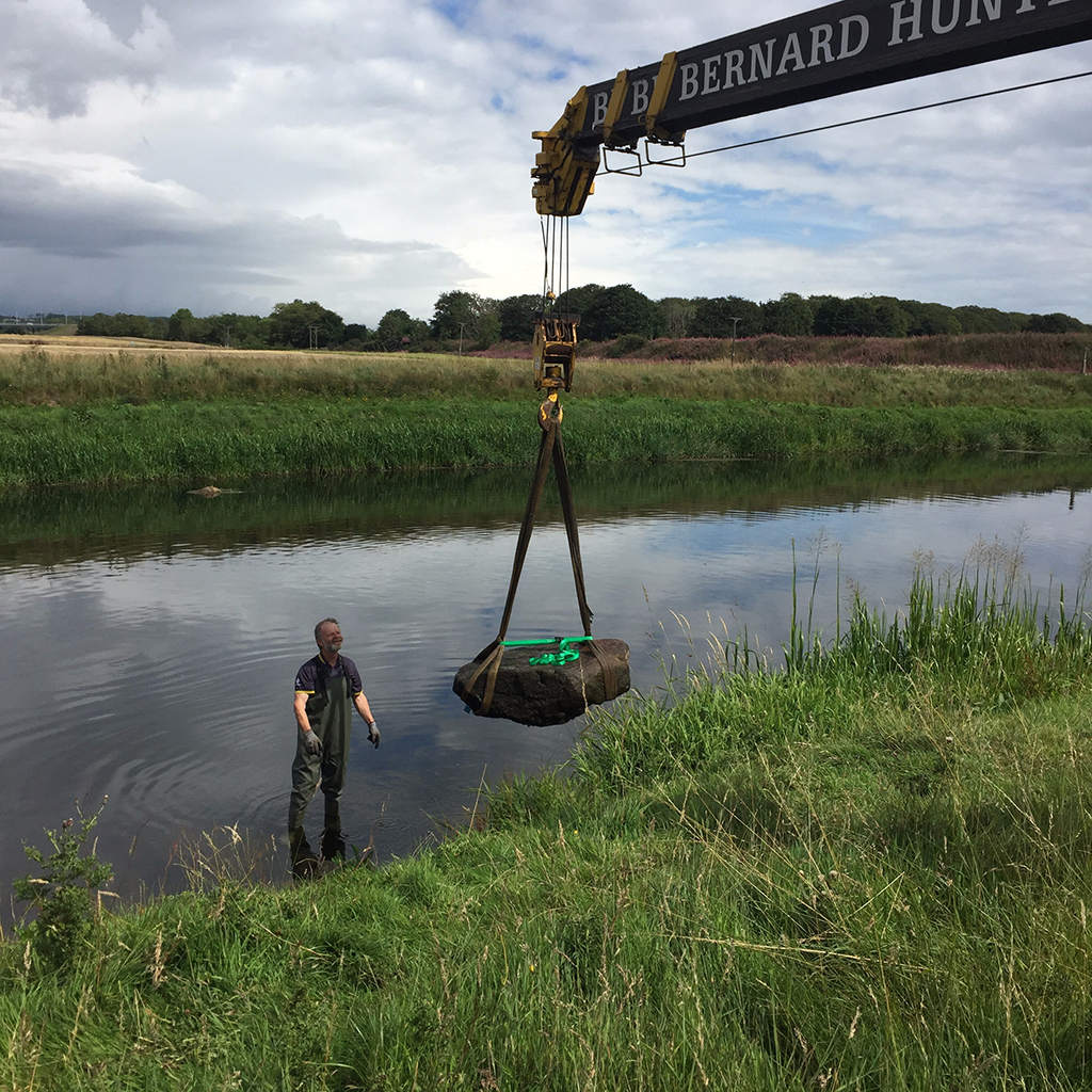 The Pictish symbol stone is removed from the River Don