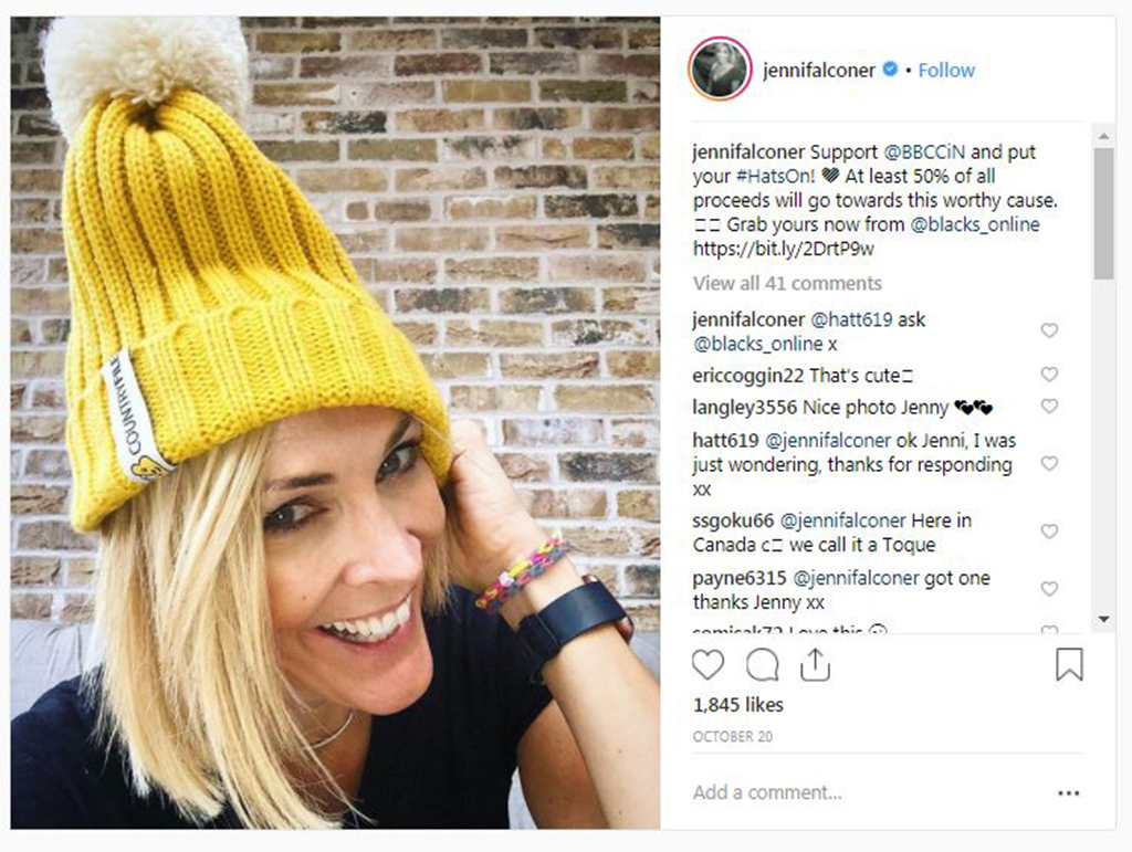 Scots TV presented Jenni Falconer tries on the hat
