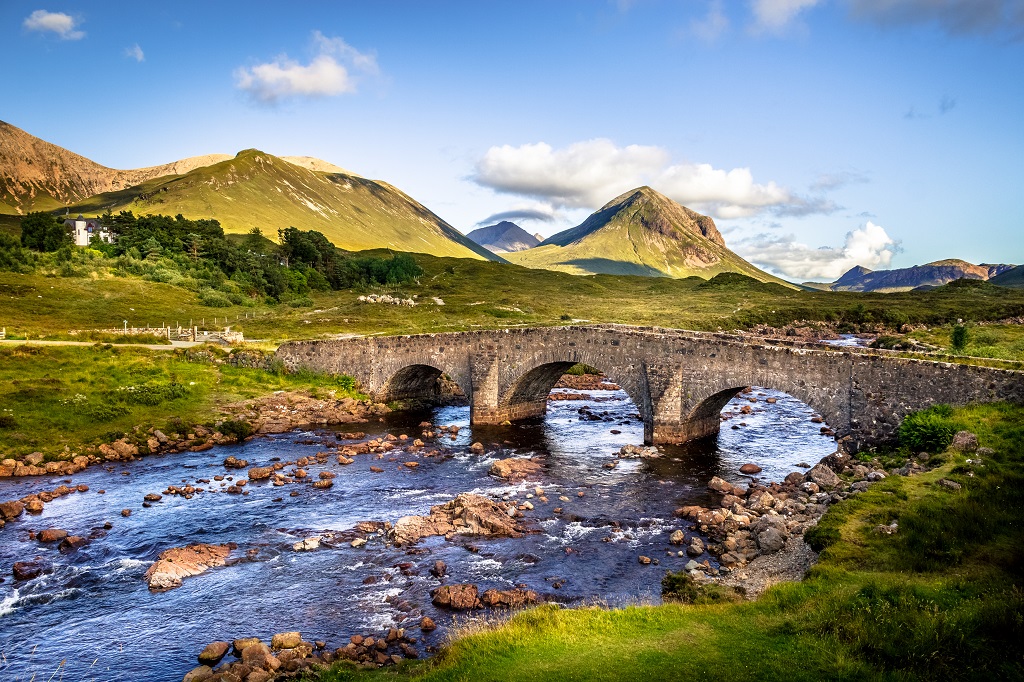 The old vintage brick bridge crossing river in Sligachan, Isle of Skye