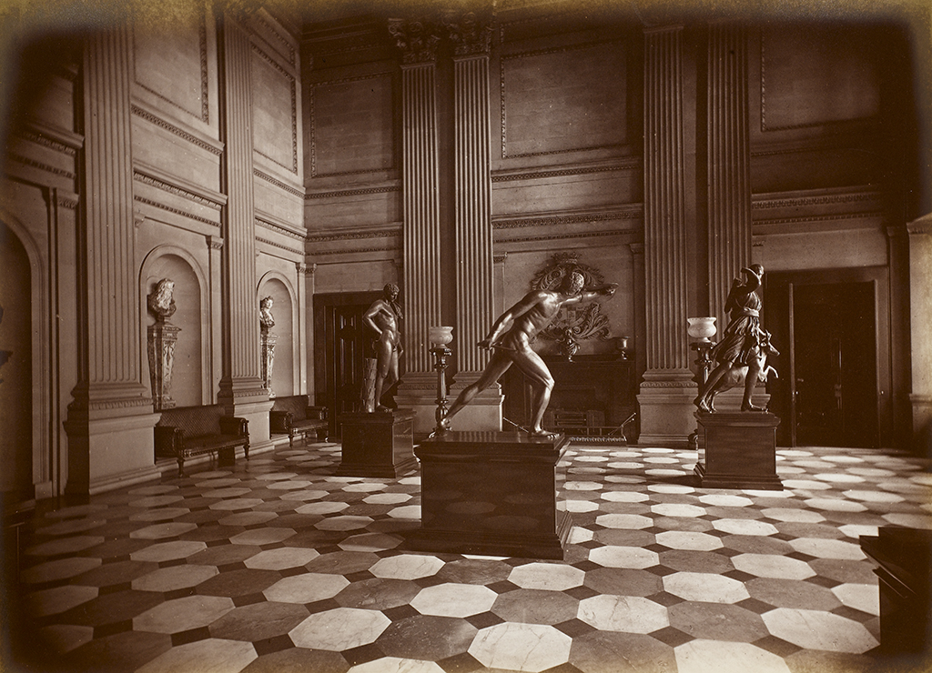 The Marble Hall on the first floor, showing three of the five bronze statues associated with King Francis I of France