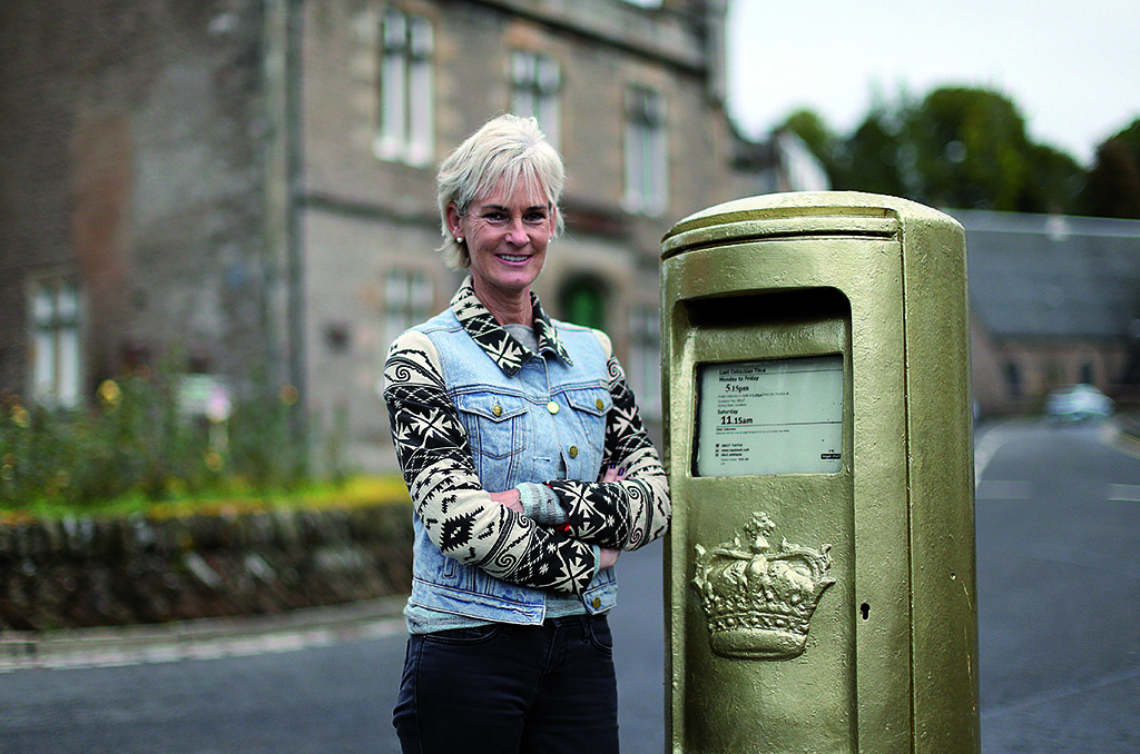 Judy Murray with the postbox painted gold after son Andy's Olympic gold medal win in 2012 (Photo: Ian MacNicol)