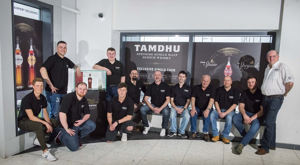 The full Tamdhu Distillery team at Edinburgh Airport