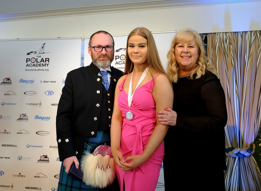 Alex Cochrane pictured with her mum Fiona Cochrane and Craig Mathieson, founder of The Polar Academy during the medal ceremony (Photo: Mike Wilkinson Photography)