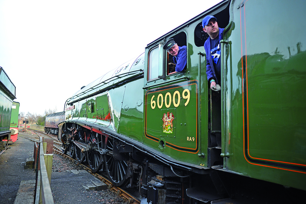 The drivers prepare
for the journey (Photo: Angus Blackburn)