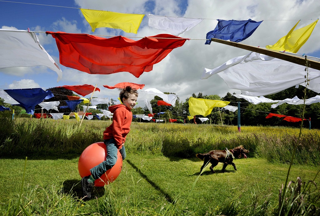 Having fun at the East Neuk Festival preview is Rory Hattersley-Smith (5), enjoying the windy weather (Photo: Colin Hattersley)