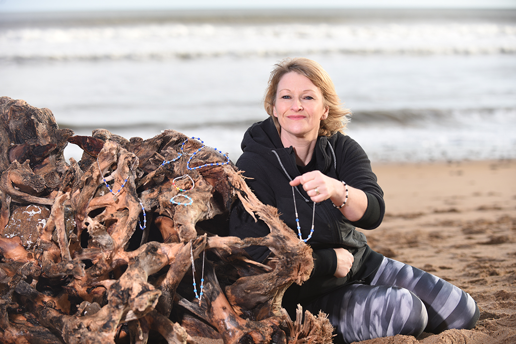 Arlene Barclay with some of her recycled plastic jewellery creations (Photo: Angus Blackburn)