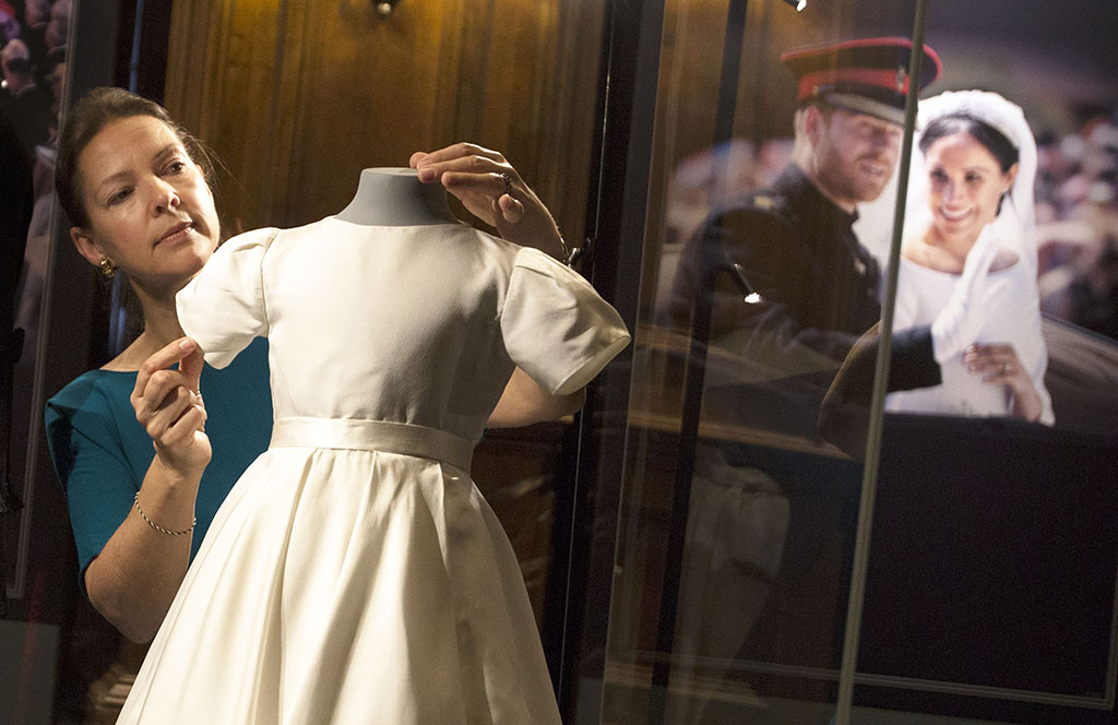 Curator Caroline de Guitaut tweaks the displays (Photo: David Cheskin)