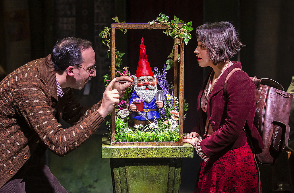 Amelie with her father - and her mother's ashes in the gnome