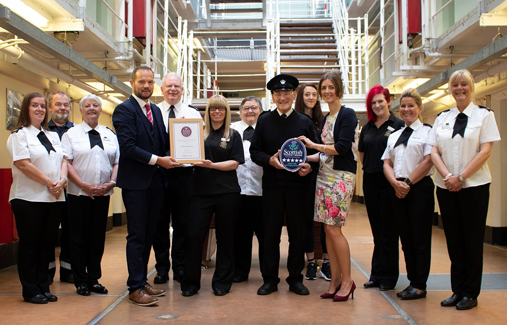 The Peterhead Prison Museum team with Den McFarlane (VisitScotland Industry Relationship Manager) and Jo Robinson (VisitScotland Regional Director) presenting the Taste Our Best award