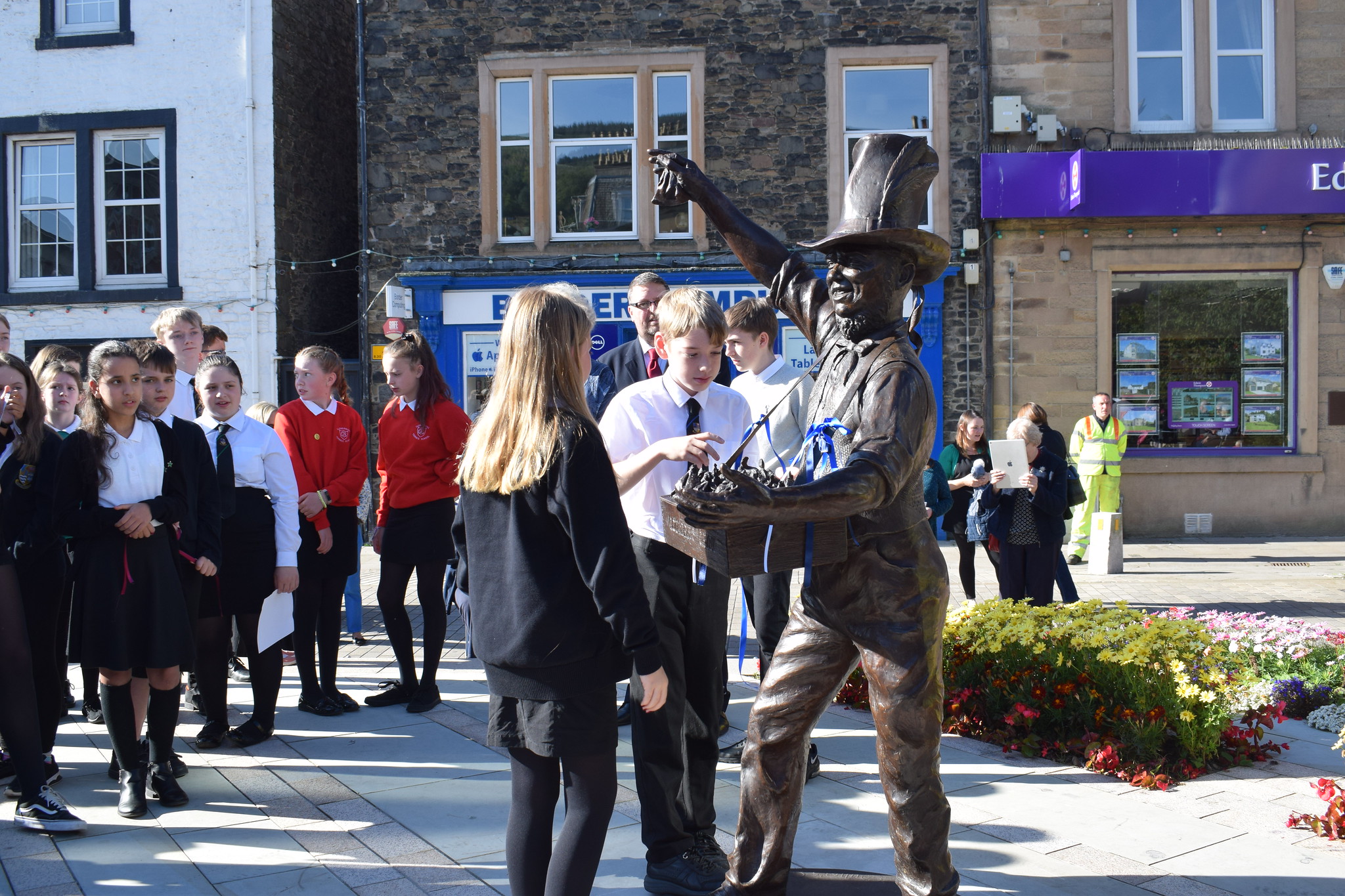 Children were able to get sweets at the statue unveiling