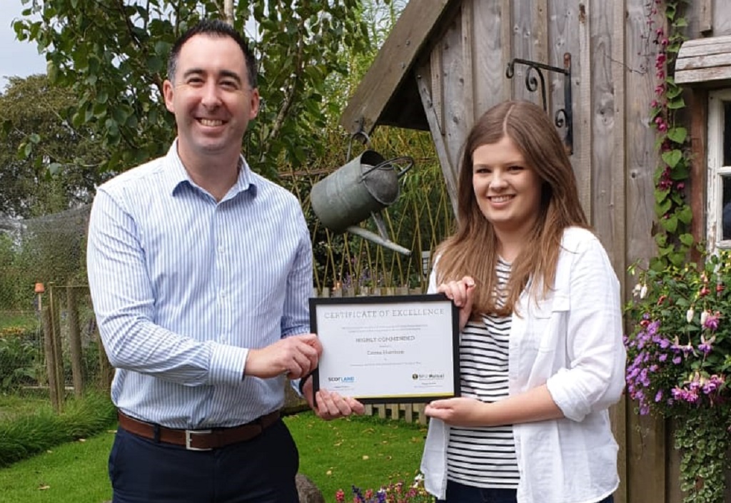 Keith Thom (NFU Mutual Strathaven &amp; Lanark Agent) presented the highly commended certificate to Emma Harrison at The Biscuit Barn premises in Lesmahagow.
