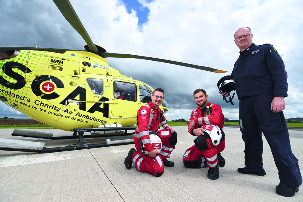 Paramedics Darren O’Brien and Matt Allen, and pilot Russell Myles work at the Perth base of Scotland's Charity Air Ambulance (Photo: Angus Blackburn)