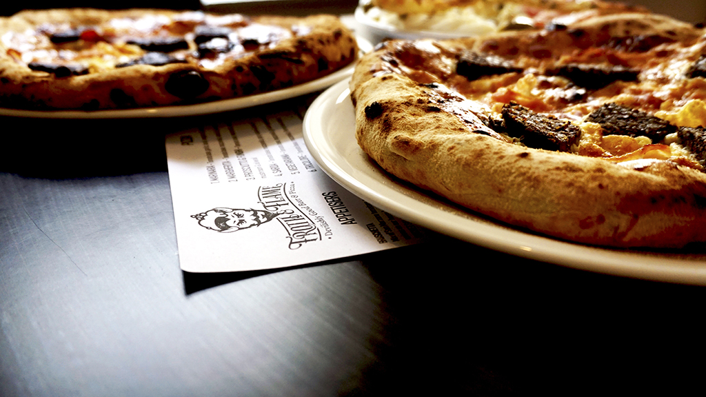 The thin bases and fluffy crusts of the pizzas are truly delicious.