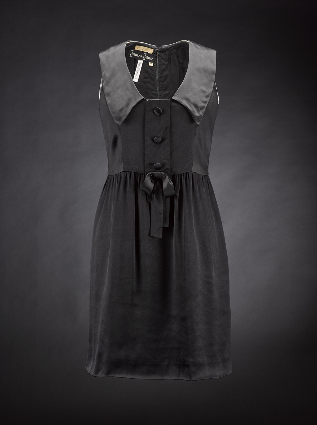 A black satin dress, worn and owned by Joanna Lumley, designed by Jean Muir, c. 1964