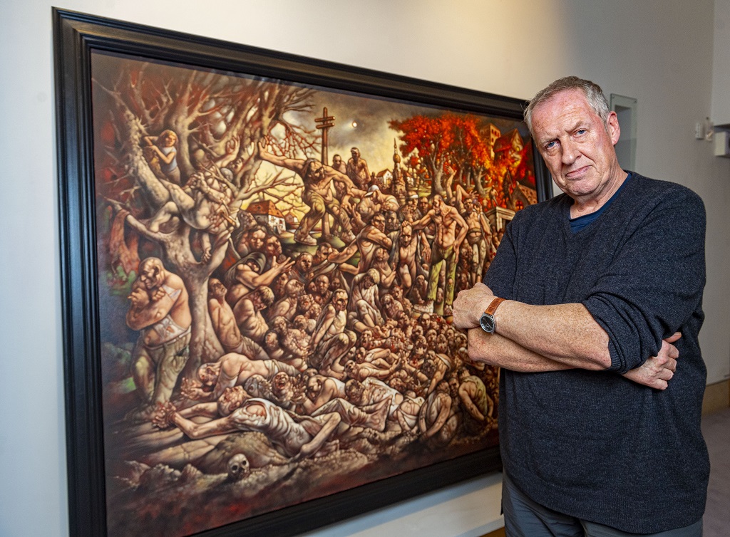 Artist Peter Howson unveils a new painting at St Mungo Museum, Glasgow to commemorate the 25th Anniversary of the Srebrenica Massacre (Photo by Bill Murray/ SNS Group)