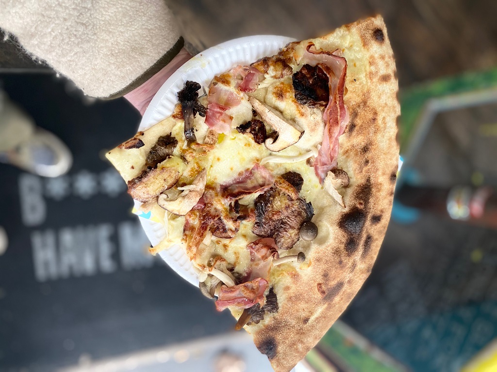 A slice of the Truffle Shuffle pizza