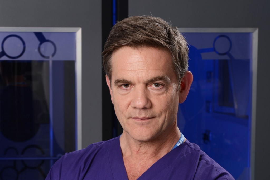 John Michie as Guy Self in Holby City