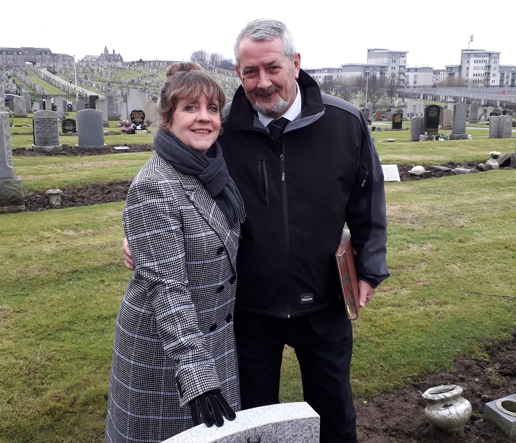 Sally Nilsson and Ian Burnett at the graveside