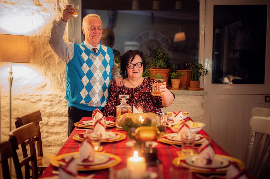 Haggis factory owners Jimmy (Jimmy Chisholm) and Isobel  (Elaine MacKenzie Ellis) are keen to brag about their latest award for their outstanding Haggis (Photo: Velvet Wolf Films /  Tommy Ga-ken Wan / BBC Scotland)