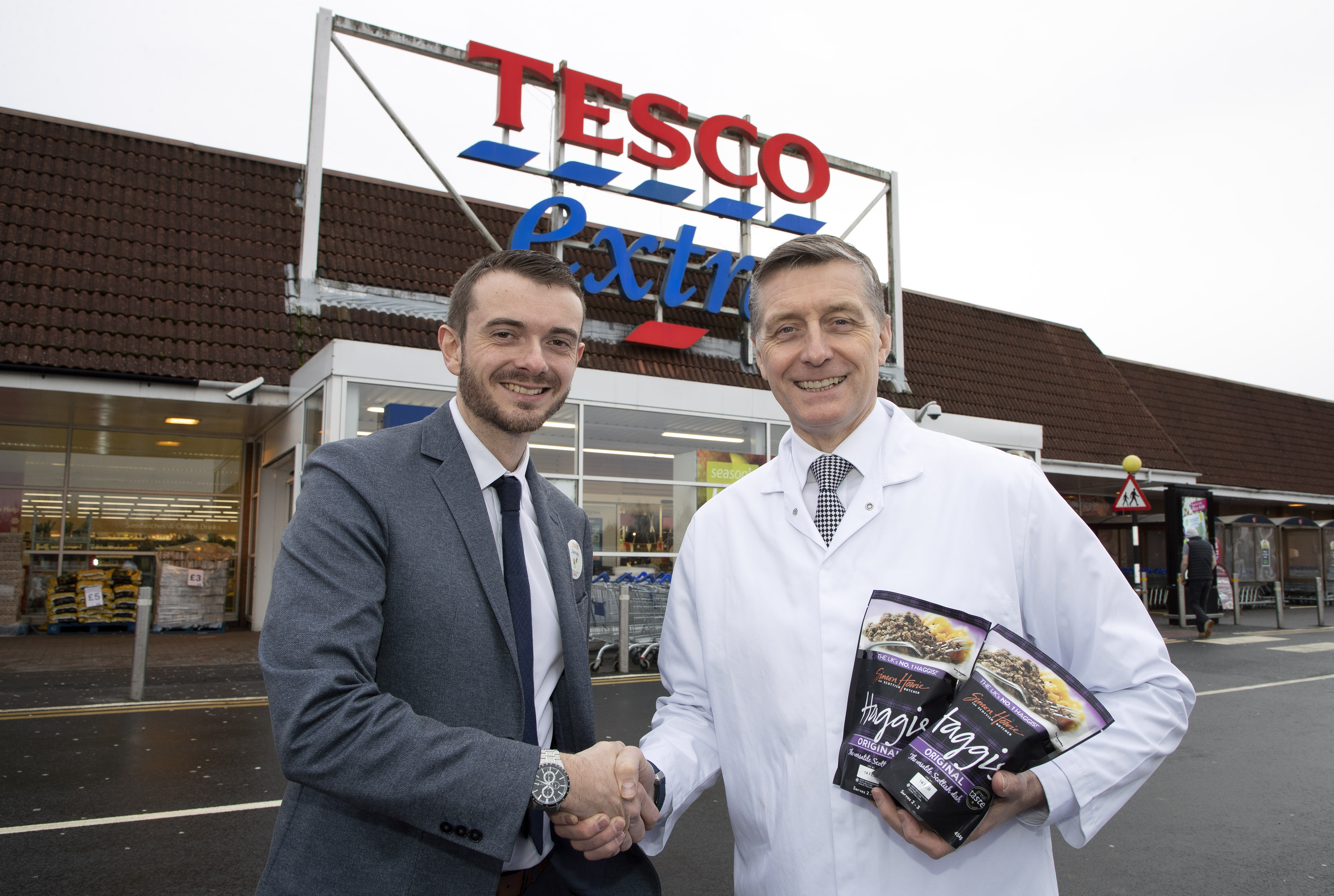 Simon Howie pictured with his haggis at the Tesco store on Crieff Road in Perth alongside buying manager James Lamont
for further info please contact Holly Kidd at Big Partnership on 0131 557 5252 or holly.kidd@bigpartnership.co.uk
Picture by Graeme Hart.
Copyright Perthshire Picture Agency
Tel: 01738 623350  Mobile: 07990 594431