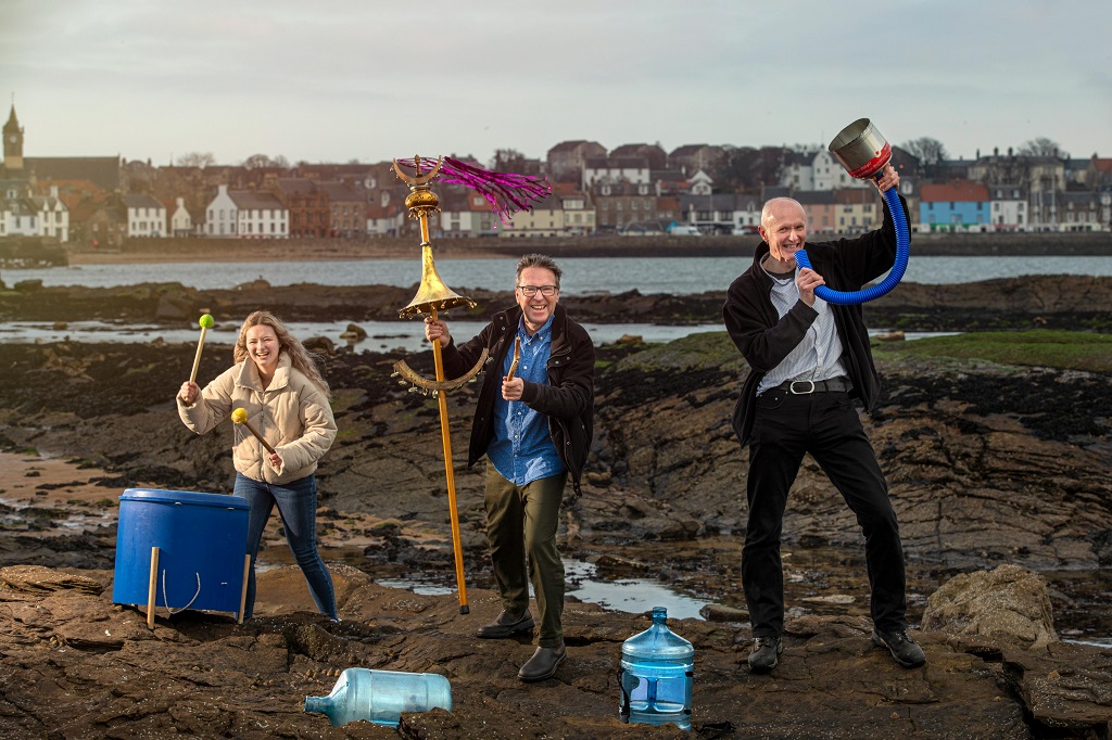 Richard Wemyss (white shirt) and Ellie Deas from the Cellardyke Sea Queen Festival join composer and instrument maker Graeme Leak to turn beach rubbish into musical instruments (Photo: East Neuk Festival)
