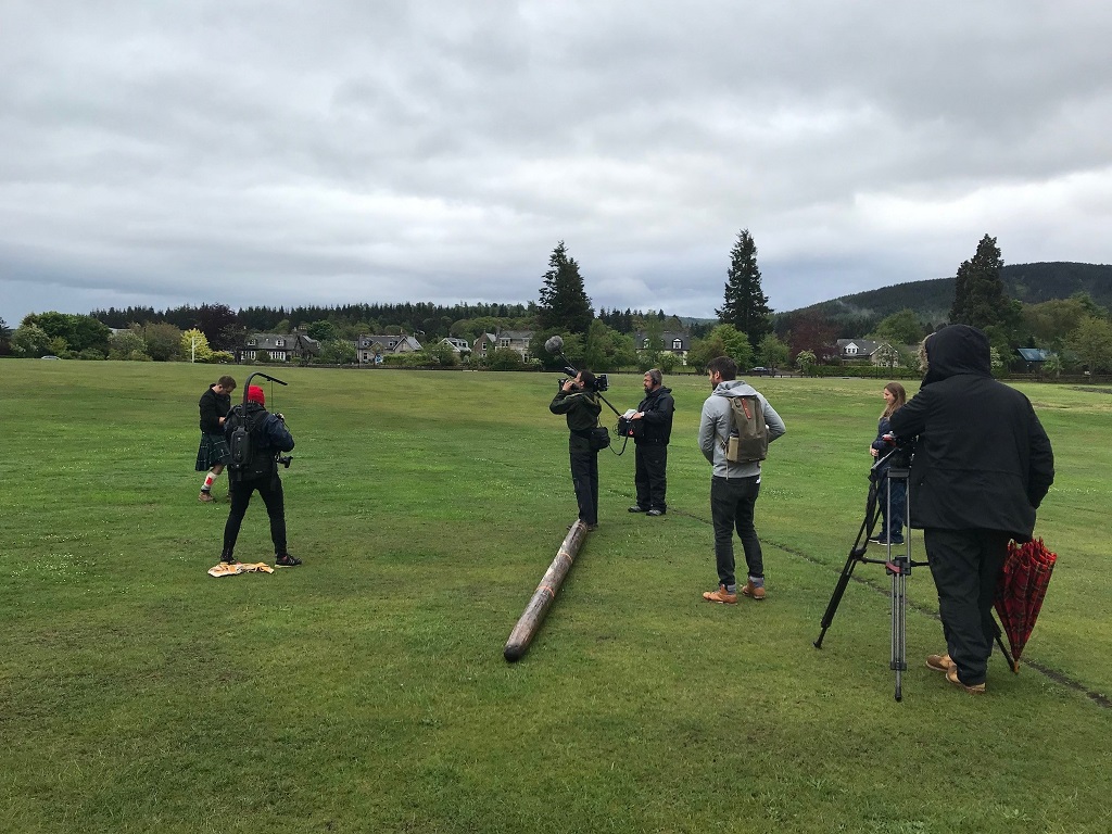 Jamie Dawkins (in kilt) during filming of Walking Britain's Lost Railways on Aboyne Green