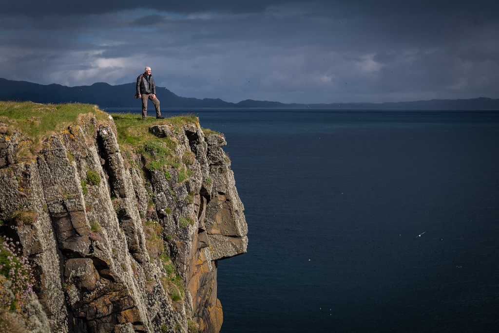 Outdoor photographer Paul Sharman of Hebridean Adventures enjoying the views from the Shiant Isles in the Outer Hebrides. Photograph courtesy of Harry Martin.