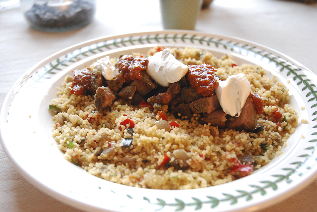 Lamb with spiced Moroccan couscous, mint yoghurt and tomato chilli jam.