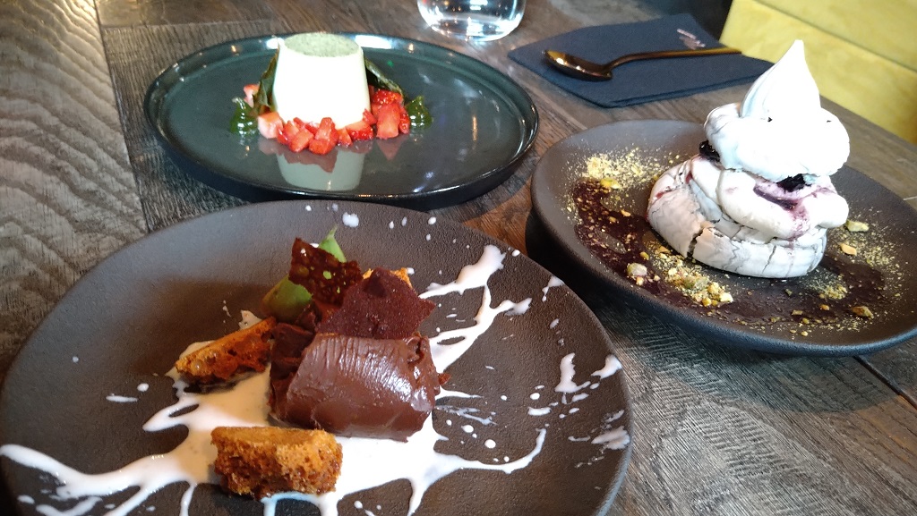 Chocolate orange ganache, the charcoal pavlova and basil panna cotta from the dessert menu at Moskito