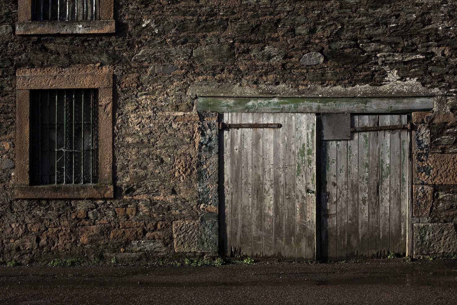 A wooden door on a disused distillery building in Glebe Street.