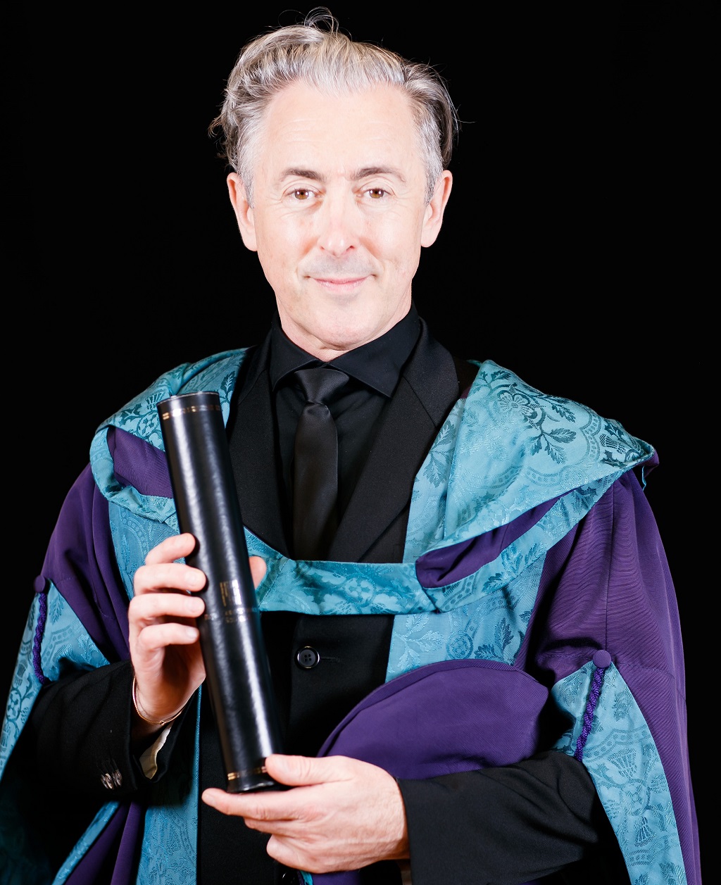 Alan Cumming with his honorary doctorate from the Royal Conservatoire of Scotland (Photo: Robert McFadzean)