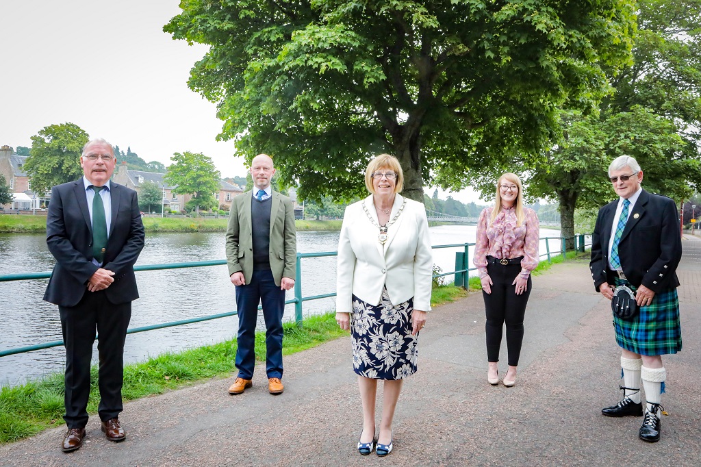 Celebrating the arrival of the Mod in Inverness are (from left) Norrie Mackay - Vice Convener of the Local Organising Committee, Councillor Calum Munro (Chair of the Gaelic Committee), Mairi Macdonald - Local Organising Committee , Depute Provost Councillor McAllister, Allan Campbell - President of An Comunn Gaidhealach 