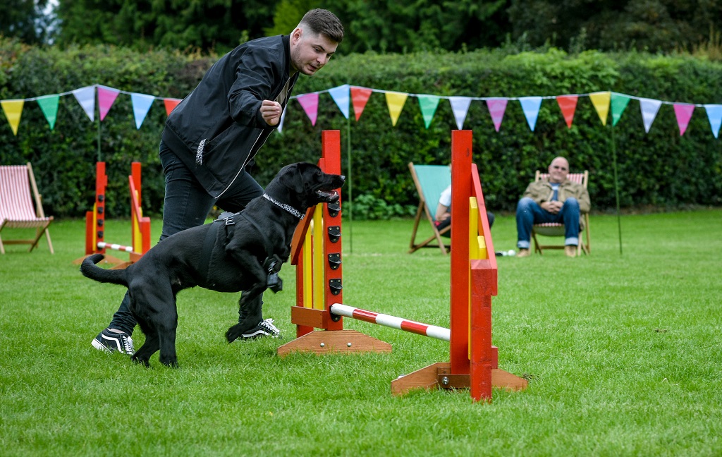 Programme Name: Scotland's Best Dog - TX: 09/12/2021 - Episode: n/a (No. 4) - Picture Shows: 'Harper' the black Labrador and her owner Scott from Rosyth, Fife.  - (C) Red Sky Productions - Photographer: Thomas Skinner